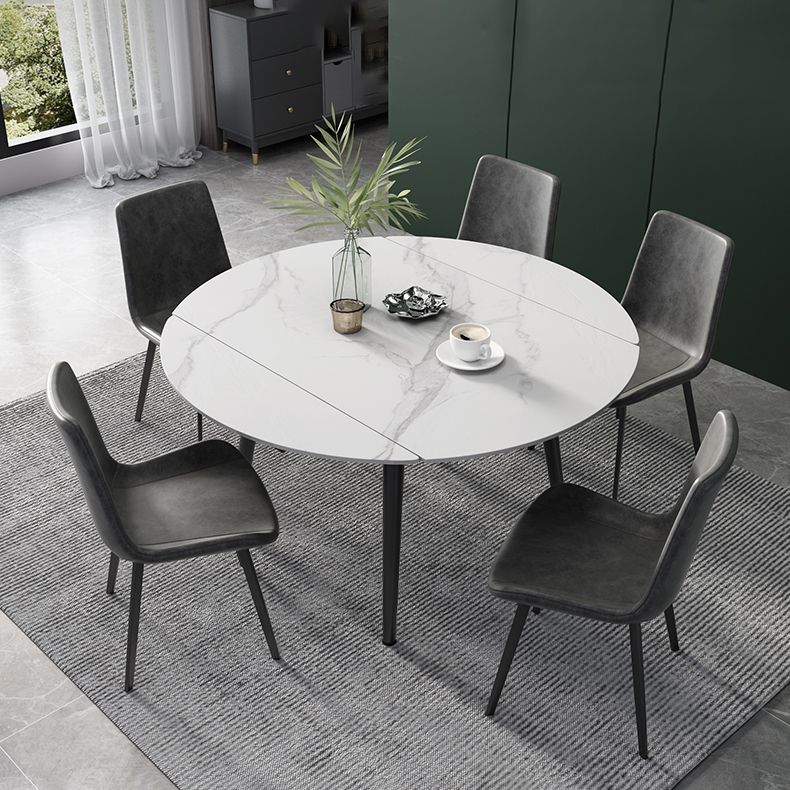 52" Round Sintered Stone Top Table Extendable 4 Legs Dining Table, Metal in Black Clearhalo ' dining_table' 'Dining Tables & Seating' 'Dining Tables' 'furn' 'furn_dining_table' 'Furniture' 'furniture_dining_table' 'Kitchen & Dining Furniture' 'kitchen&dining_furn' 'kitchen' 'kitchen_dining_table' 1200x1200_2c96ffc4-138d-4a68-98b5-25f72e7153cd