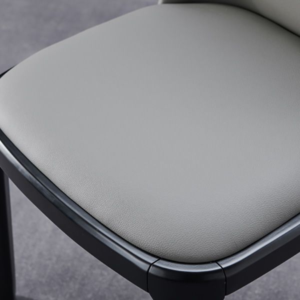 工業用アームレスダイニングチェアソリッドウッドの脚布張りのサイドチェア