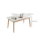 Moderne massief houten poten eettafel met rechthoekig stenen blad