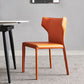 Silla lateral de ala de silla de comedor de cuero contemporánea en acabado mate con patas de acero