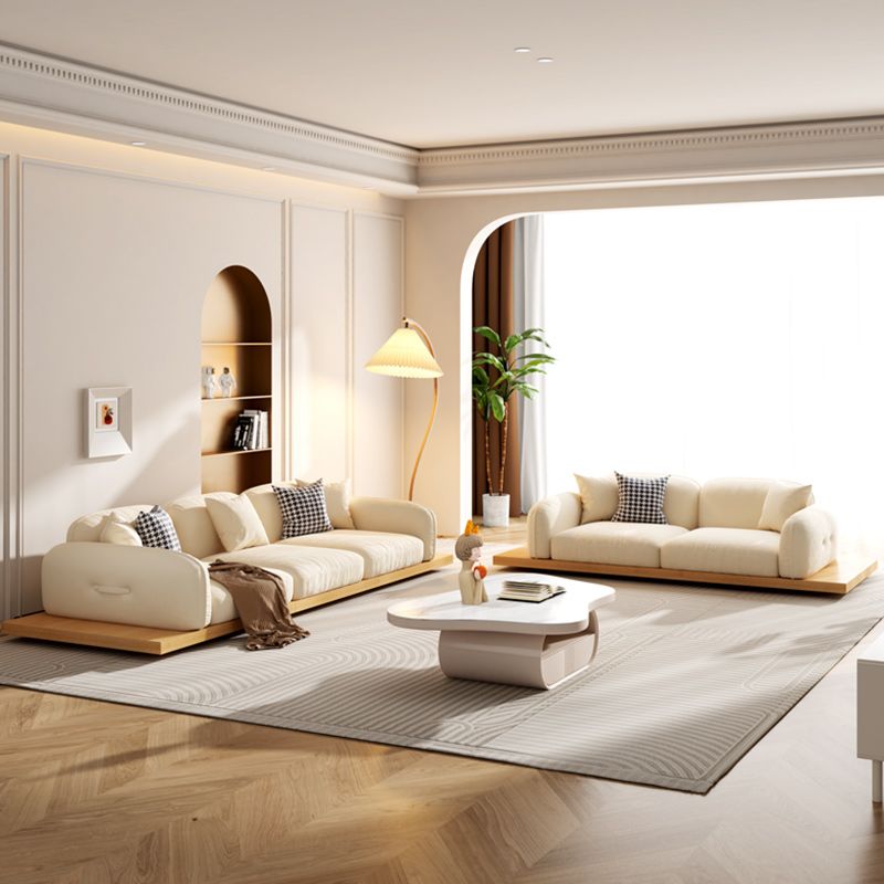 Divano sezionale di velluto contemporaneo con cuscini posteriori e braccia quadrate