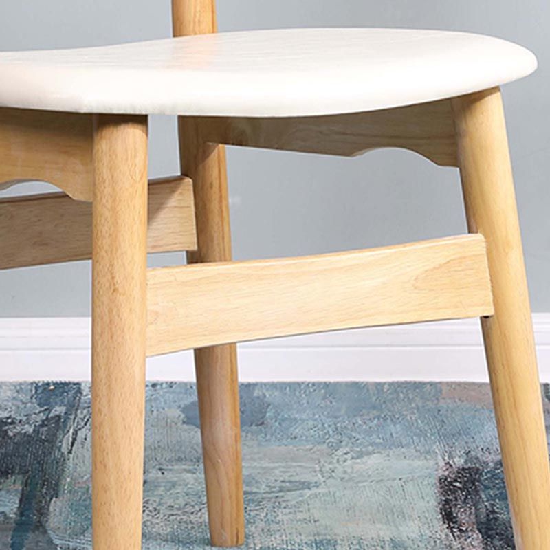 Sillas de comedor de ratán muebles de comedor abiertos con patas de madera en acabado mate