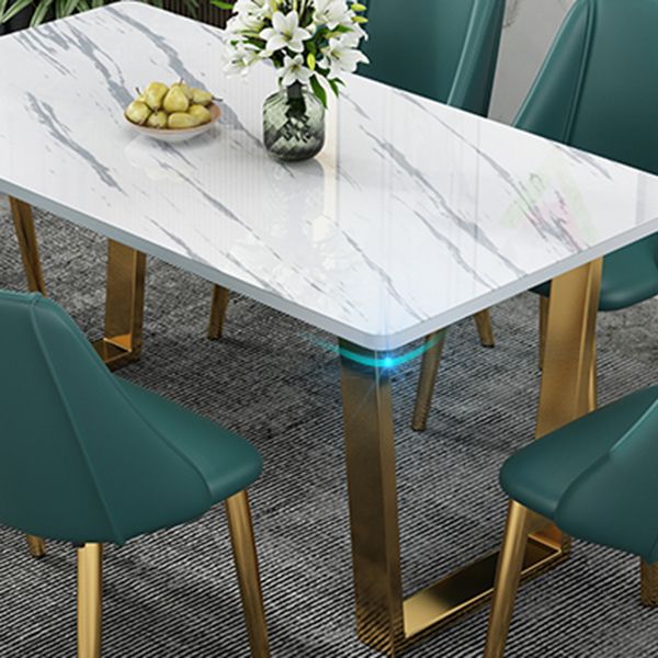 Table rectangulaire de luxe traditionnelle en métal, table en pierre frittée blanche avec base luge