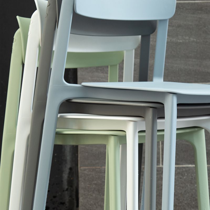 Modern Style Stackable Plastic Chair Open Back Dining Side Chair Clearhalo 'Dining Chairs' 'Dining Tables & Seating' 'dining_chair' 'furn' 'furn_dining_chair' 'Furniture' 'furniture_dining_chair' 'Kitchen & Dining Furniture' 1200x1200_2e500c95-678f-4daa-9855-40ff624d6a69