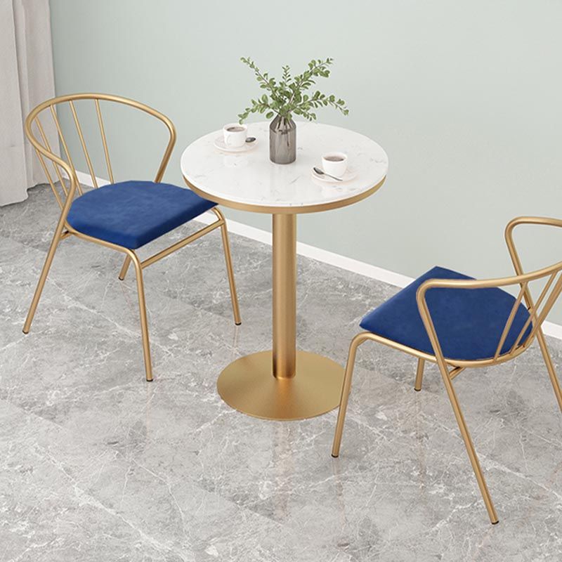 Tavolo da pranzo rotondo tradizionale tavolo in marmo con base in metallo oro