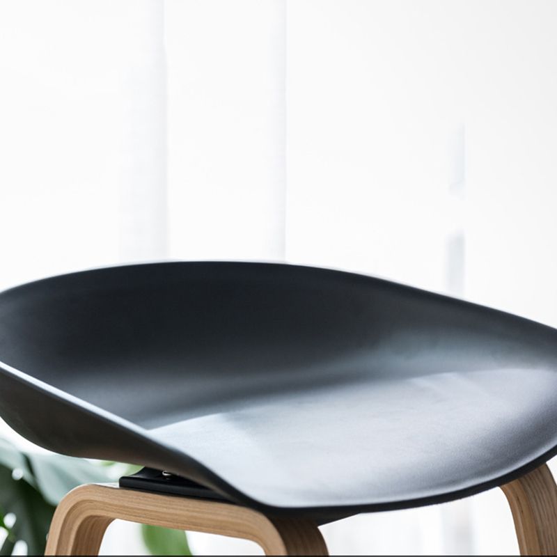 Modern Plastic Counter Stool Footrest Low Back Bucket Coffee Shop Bar Stool with Wood Legs Clearhalo 'Bar Furniture' 'Bar Stools' 'bar_stools' 'furn' 'furn_bar_stools' 'furniture_bar_stools' 'Kitchen & Dining Furniture' 'kitchen&dining_furn' 'kitchen' 'kitchen_furn' Furniture' 1200x1200_318921ca-40ef-4426-91b5-eca3a7119899