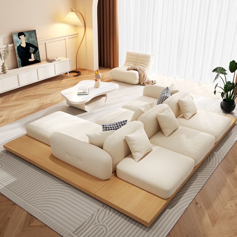 Divano sezionale di velluto contemporaneo con cuscini posteriori e braccia quadrate