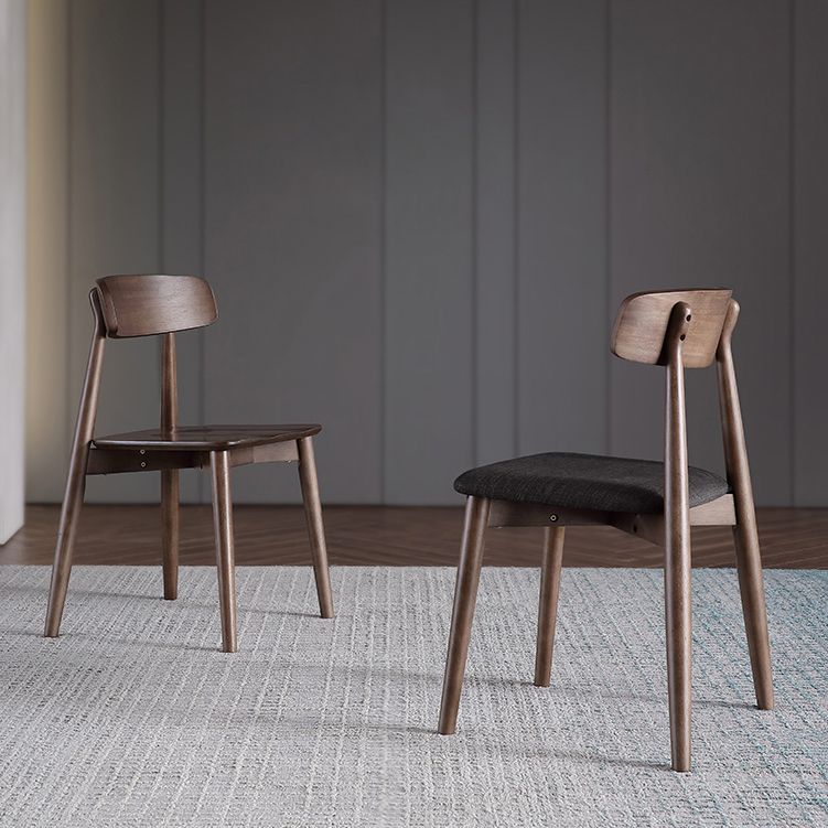 Eigentijdse stijl eetkamerstoel armloze eetkamerstoel met houten benen voor keuken