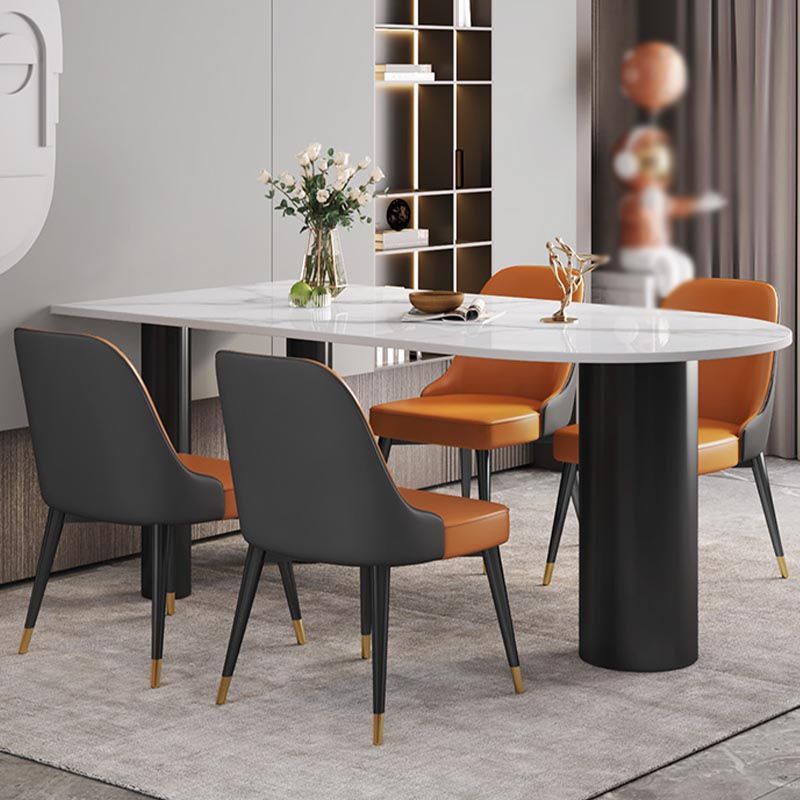 Table à manger en pierre moderne en pierre de fer ovale avec table de 3 jambes