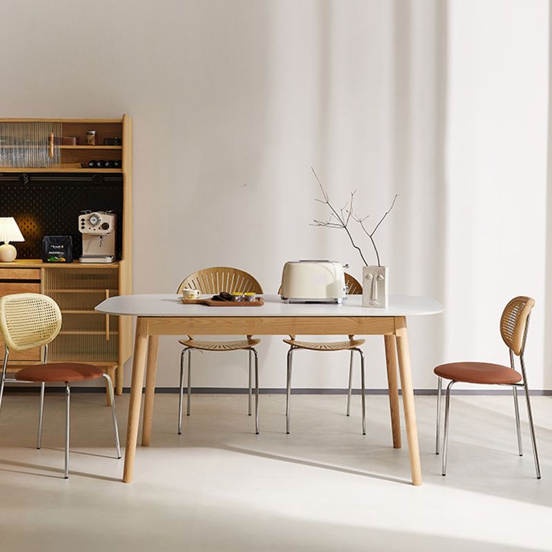 Table rectangulaire de style moderne en pierre frittée avec pieds en bois pour la maison