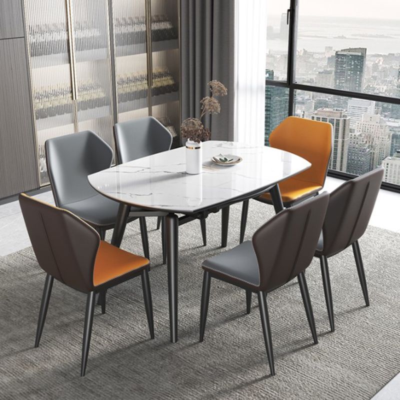 Modern Round Dining Table Sintered Stone Dining Table with 4 Black Legs,53.1"L x 31.5"W x 30"H Clearhalo ' dining_table' 'Dining Tables & Seating' 'Dining Tables' 'furn' 'furn_dining_table' 'Furniture' 'furniture_dining_table' 'Kitchen & Dining Furniture' 'kitchen&dining_furn' 'kitchen' 'kitchen_dining_table' 1200x1200_34ca2643-37d0-4a6e-93f9-f56d4b17b500