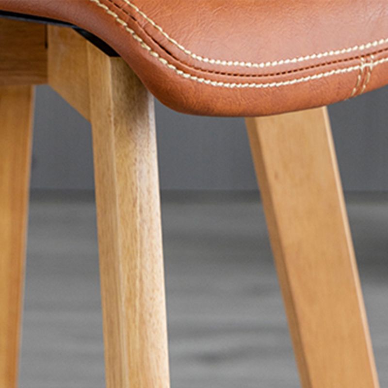Taburete de bar de cuero con acabado mate y respaldo bajo para el hogar contemporáneo