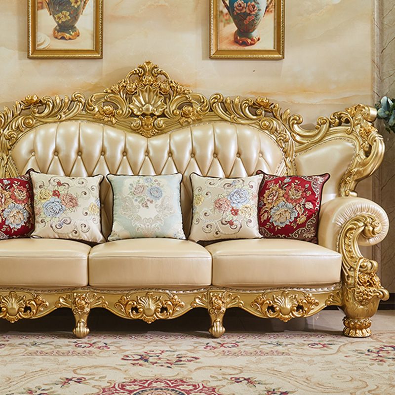 ゴールドの本革ソファ房式スプリットバックロールアームソファリビングルーム用