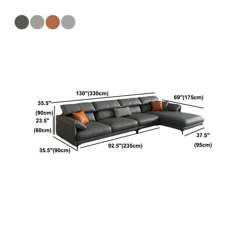 枕のトップアームを備えたソファ＆チェーズに面した現代の右手