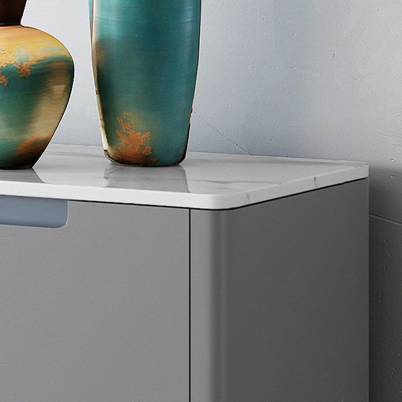 Buffet di pietra di credenza moderna e contemporanea con armadi e cassetti