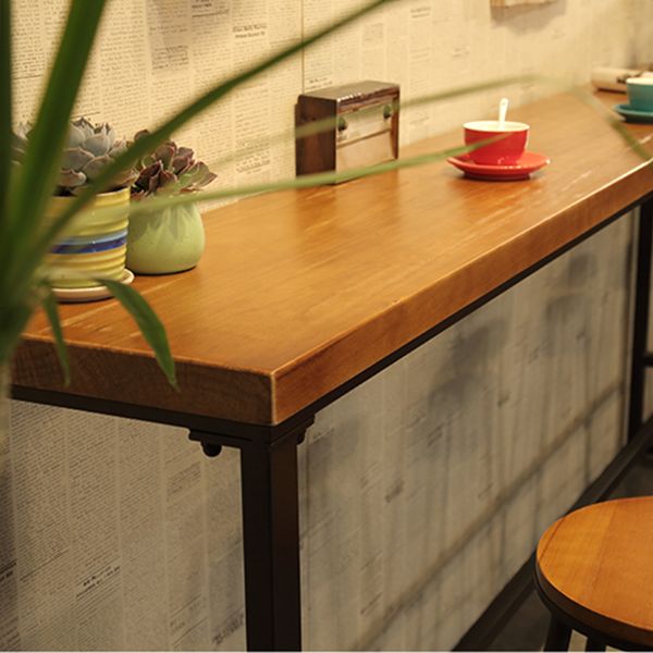 Tavolo da bistrot in legno massiccio rettangolo tavolo da pub lussuoso con base di cavalletto in nero