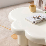 Table basse à forme libre scandinave beige avec 4 jambes en bois