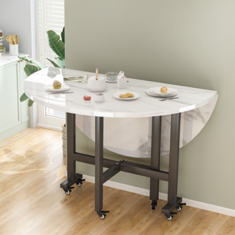Modern White Round Wooden Easy Folding Dining Table with Leaf Clearhalo 'Dining Tables & Seating' 'Dining Tables' 'dining_table' 'furn' 'furn_dining_table' 'Furniture' 'Kitchen & Dining Furniture' 1200x1200_3920c17e-4499-4280-844e-7074ec626290
