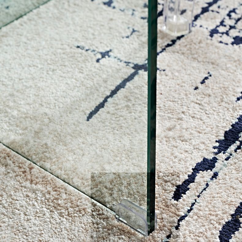 Moderne rechthoekige eettafel met glazen blad en dubbel voetstuk