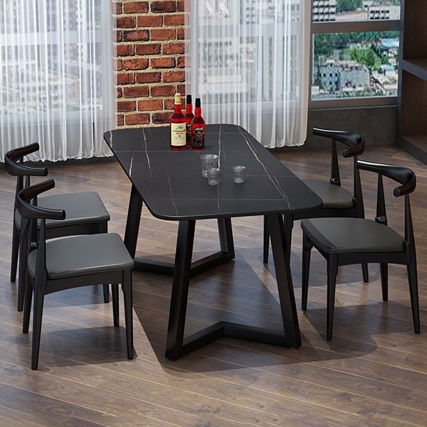 Mesa de comedor rectangular industrial de piedra sinterizada negra con base de metal