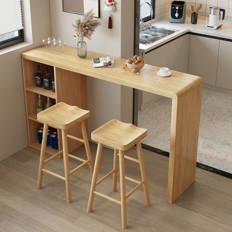 Solid Wood Bar Dining Table Pedestal Rectangle Bistro Bar Table in Natural with Shelves Clearhalo 'Bar Furniture' 'Bar Tables' 'bar_tables' 'furn' 'furn_bar_tables' 'Furniture' 'Kitchen & Dining Furniture' 1200x1200_3b8b55ca-e0e2-4731-9344-12886e3a80b5
