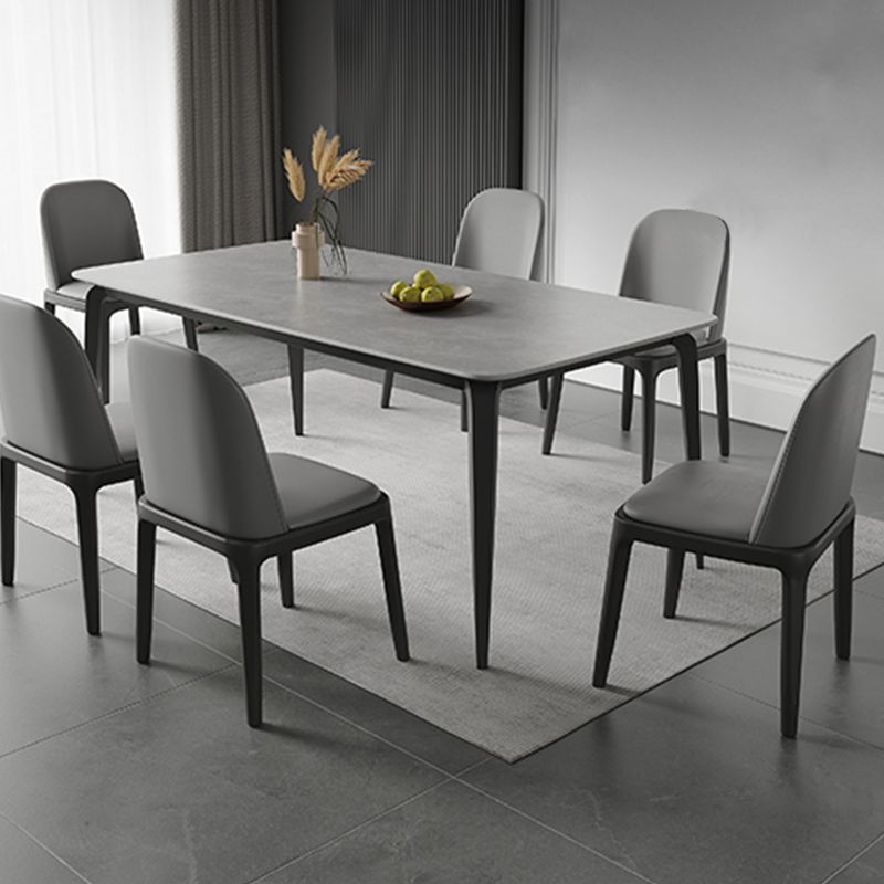 Tavolo da pranzo in pietra rettangolare con mobili in stile moderno in grigio