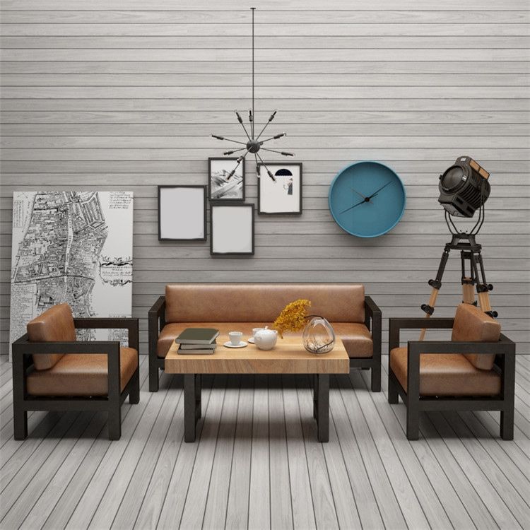 Divano in pelle marrone contemporanea con piazza nera in ferro per appartamento