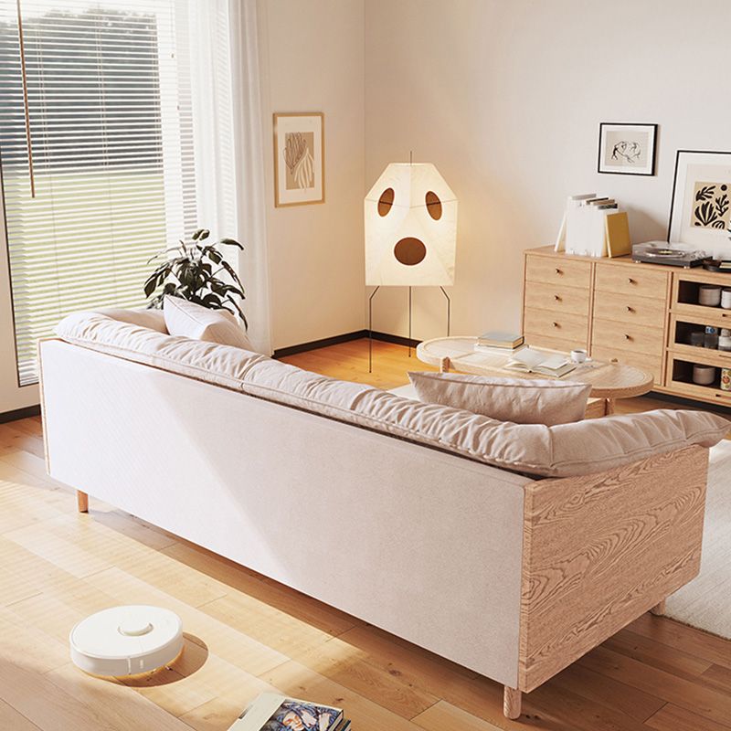 Scandinavische losse achterbank met kussen bovenarm in massief hout en linnen