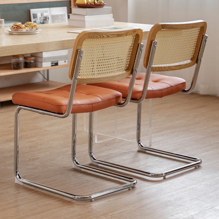 Silla lateral tapizada silla de brazo trasero de estilo moderno con base cromada