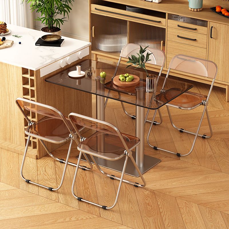 Finitura lucidata 1/4/5 PC set da pranzo con tavolo da pranzo in vetro e sedie pieghevoli