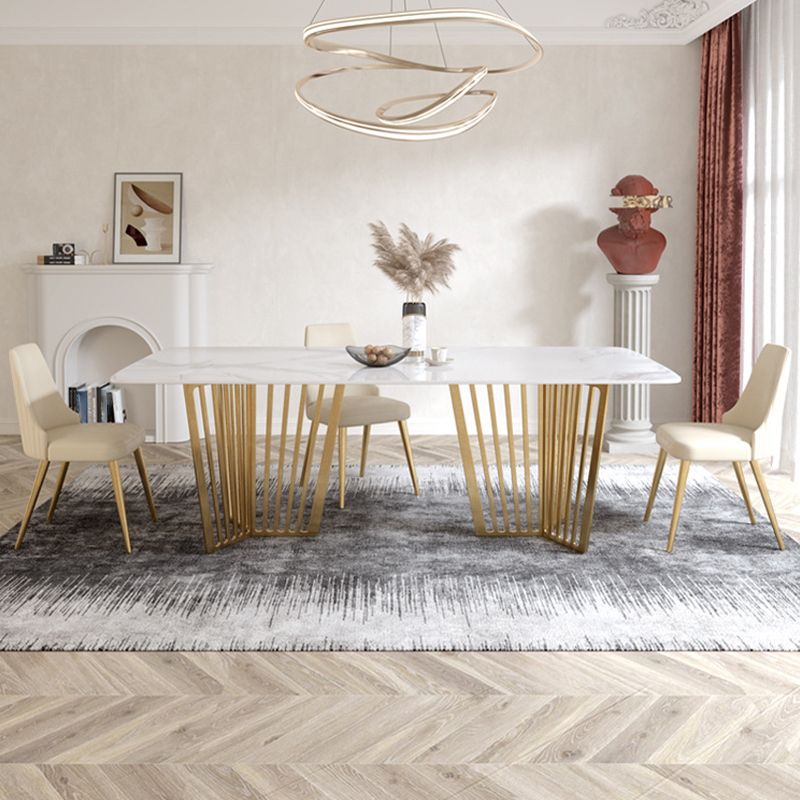 豪華な焼結石トップホワイトテーブル長方形のダイニングテーブルと金の二重の台座