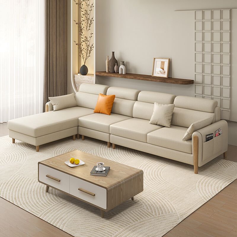 Sezione beige in pelle di divano sezionale scandinava con cuscini