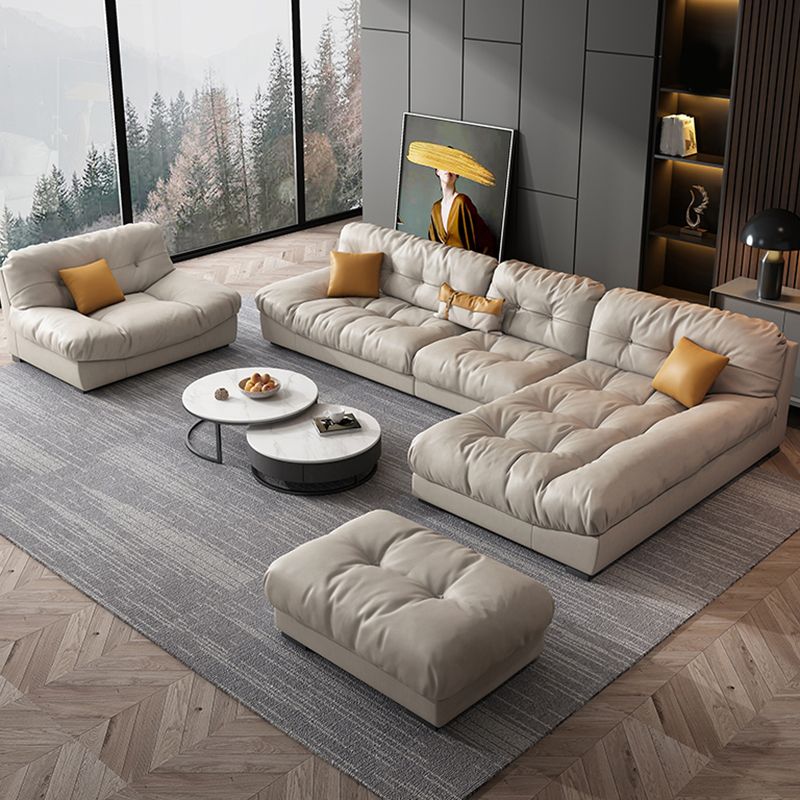 Sofá minimalista de cuero sintético contemporáneo y cojines con almohada de almohada de chaise sofá