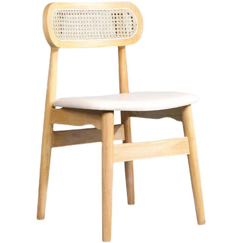 Sillas de comedor de ratán muebles de comedor abiertos con patas de madera en acabado mate