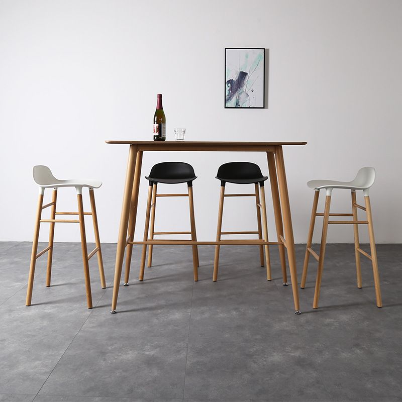 Modern Counter Bar Stool Armless Plastic Indoor Bar Stool with Footrest and Wood Base Clearhalo 'Bar Furniture' 'Bar Stools' 'bar_stools' 'furn' 'furn_bar_stools' 'furniture_bar_stools' 'Kitchen & Dining Furniture' 'kitchen&dining_furn' 'kitchen' 'kitchen_furn' Furniture' 1200x1200_45b88b98-d576-4ea1-8145-34465c87ec50