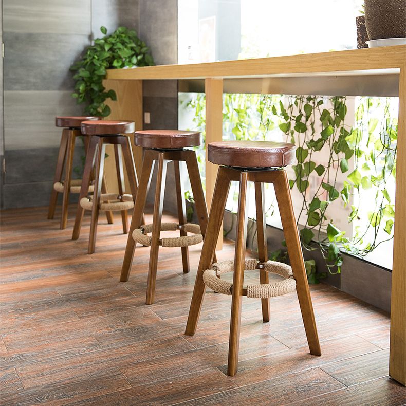 Modern Counter Bar Stool Armless Leather Bar Stool with Footrest and Swivel, Wood Base Clearhalo 'Bar Furniture' 'Bar Stools' 'bar_stools' 'furn' 'furn_bar_stools' 'furniture_bar_stools' 'Kitchen & Dining Furniture' 'kitchen&dining_furn' 'kitchen' 'kitchen_furn' Furniture' 1200x1200_45e165e3-d06c-4c44-a810-c08ef2174ab5