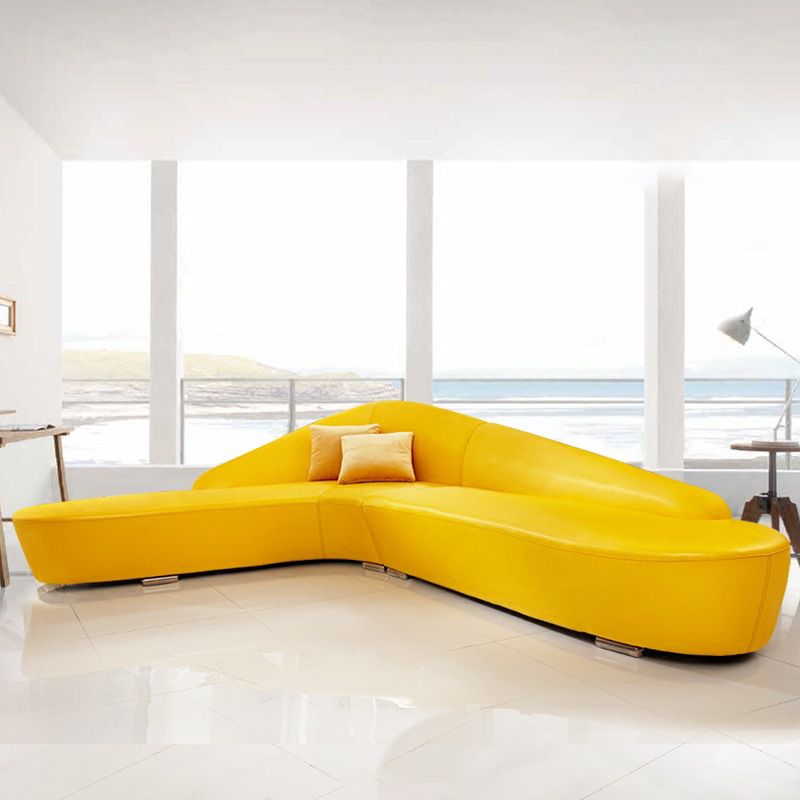 Eigentijdse hellende arm zit lederen bank voor woonkamer