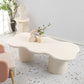Mesa de centro escandinava de forma libre con base de madera en beige