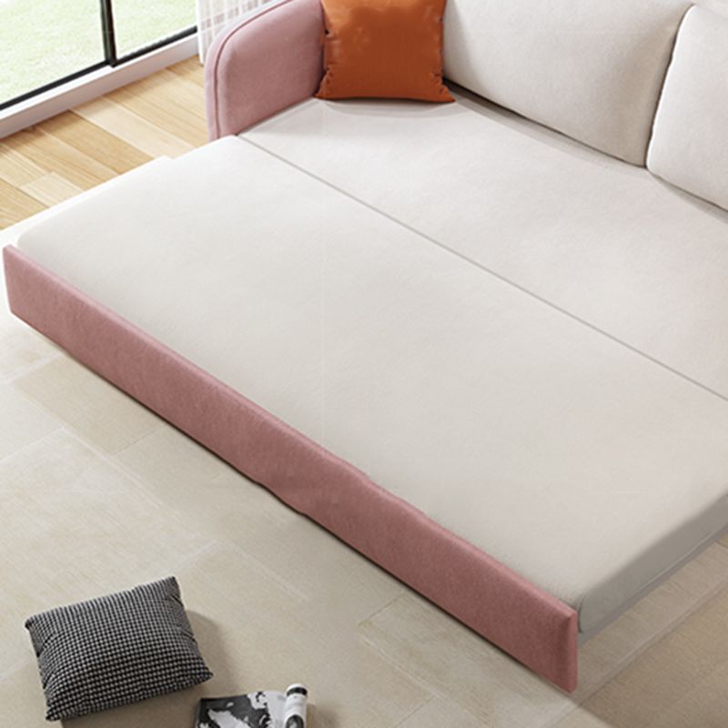 ピンクと白の枕とモダンな四角い腕のベッドソファソファ