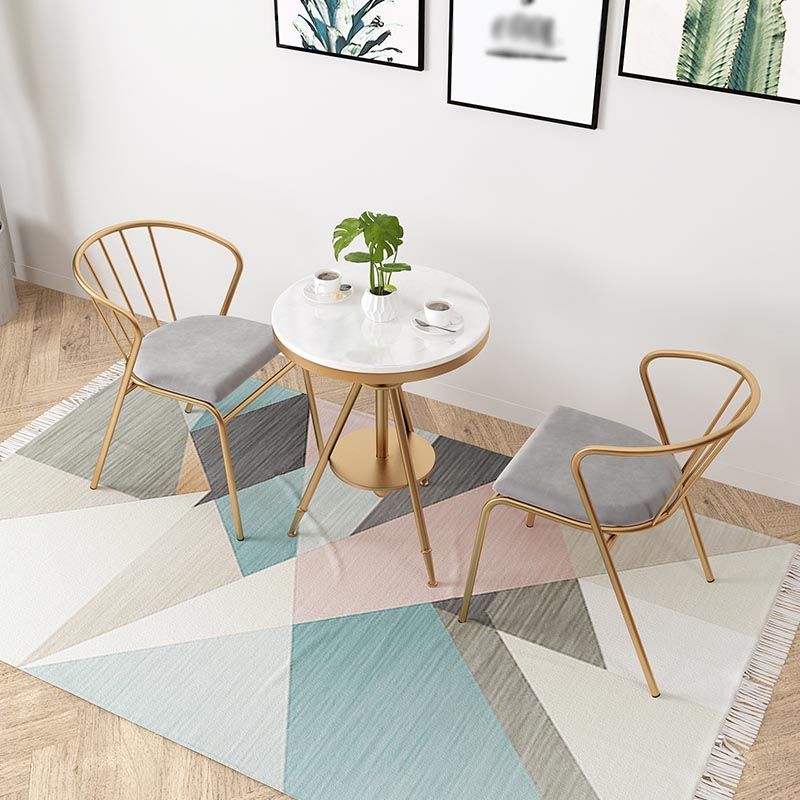 Tavolo da pranzo rotondo tradizionale tavolo in marmo con base in metallo oro