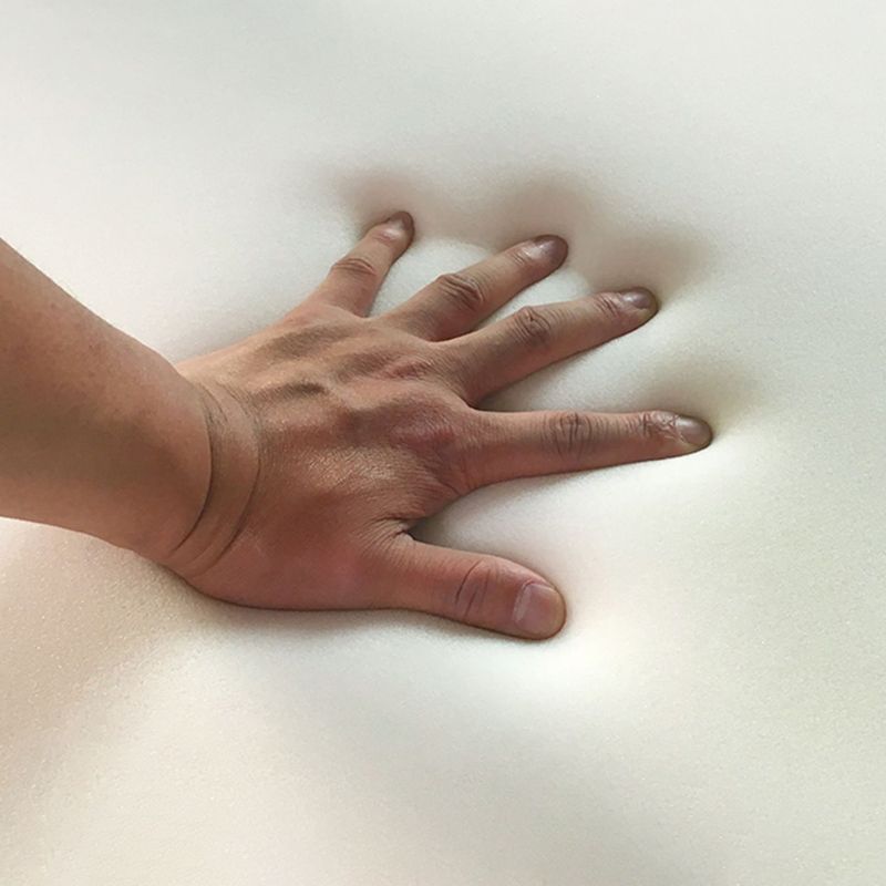 Moderno e contemporaneo in finta pelle imbottita di divano futon in bianco