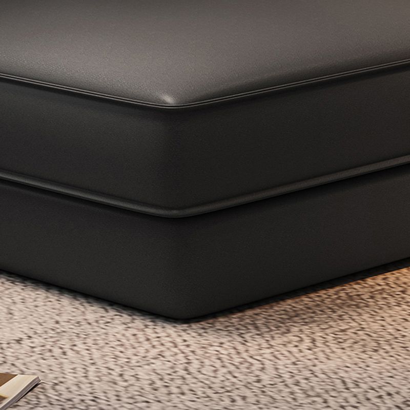 Divano in finta pelle scandinavo grigio scuro del braccio quadrato.