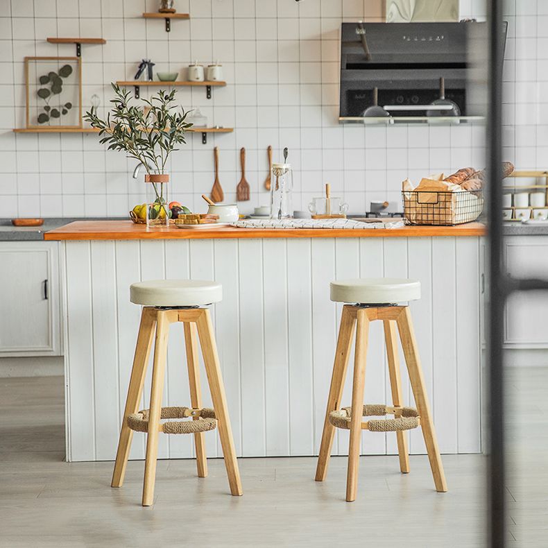 Modern Counter Bar Stool Armless Leather Bar Stool with Footrest and Swivel, Wood Base Clearhalo 'Bar Furniture' 'Bar Stools' 'bar_stools' 'furn' 'furn_bar_stools' 'furniture_bar_stools' 'Kitchen & Dining Furniture' 'kitchen&dining_furn' 'kitchen' 'kitchen_furn' Furniture' 1200x1200_4999e09f-8b6e-405a-80fc-bd9ee2ac8ca5