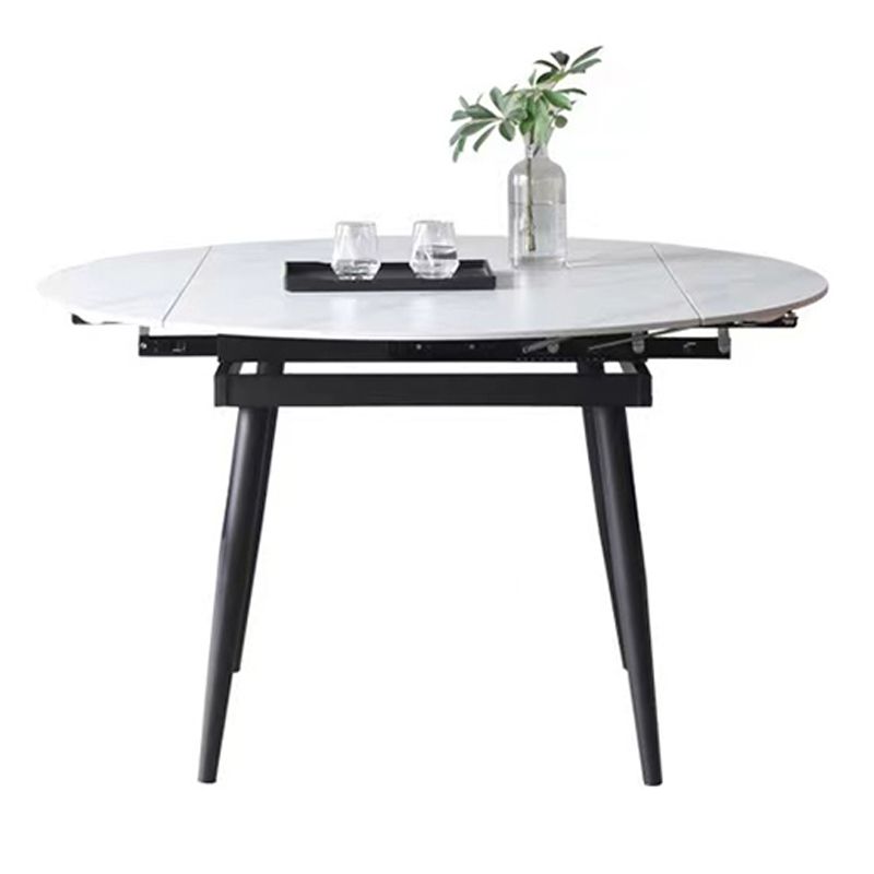 53.15''L Round Contemporary Dining Table Sintered Stone Table with 4 Black Metal Legs Clearhalo ' dining_table' 'Dining Tables & Seating' 'Dining Tables' 'furn' 'furn_dining_table' 'Furniture' 'furniture_dining_table' 'Kitchen & Dining Furniture' 'kitchen&dining_furn' 'kitchen' 'kitchen_dining_table' 1200x1200_49ea3c17-225d-4a25-ab7f-31a2880313a7