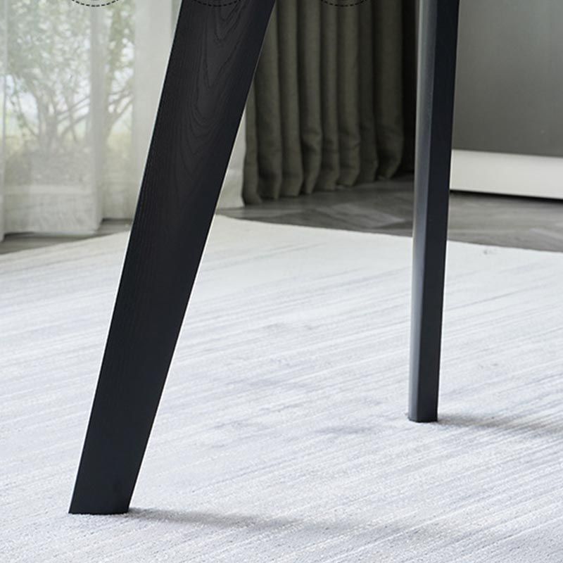 Eigentijdse stenen eettafel rechthoek eettafel met 4 houten benen in zwart