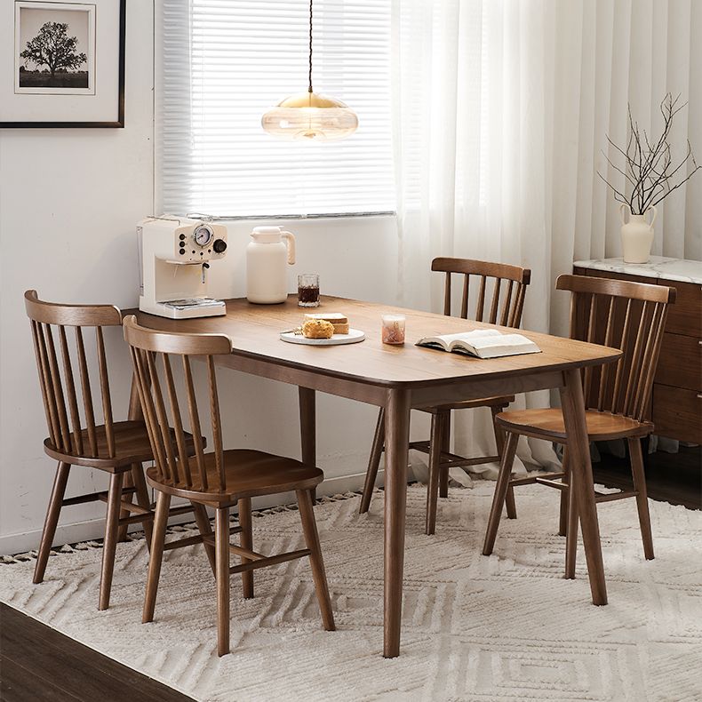 Modern Rectangular Space Saving Brown Walnut Dining Table with 4 Legs Clearhalo 'Dining Tables & Seating' 'Dining Tables' 'dining_table' 'furn' 'furn_dining_table' 'Furniture' 'Kitchen & Dining Furniture' 1200x1200_4b1acc8f-682b-43e5-806f-7421c94bd47f