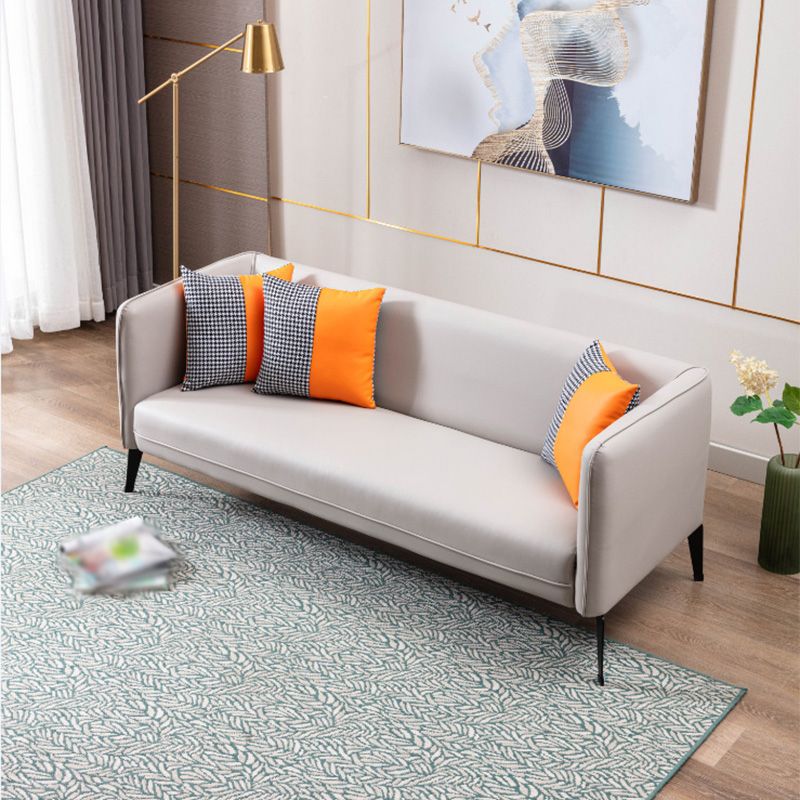 スカンジナビアのフェイクレザーリビングルーム用の正方形の腕を持つタイトなバックソファ