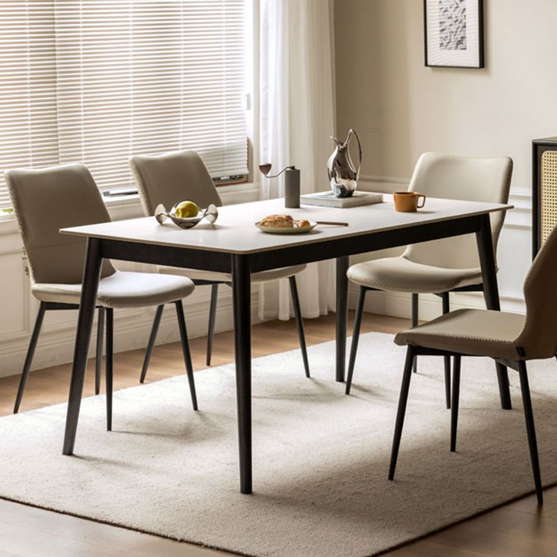 Mesa de comedor blanca de piedra rectangular moderna con 4 piernas negras de roble