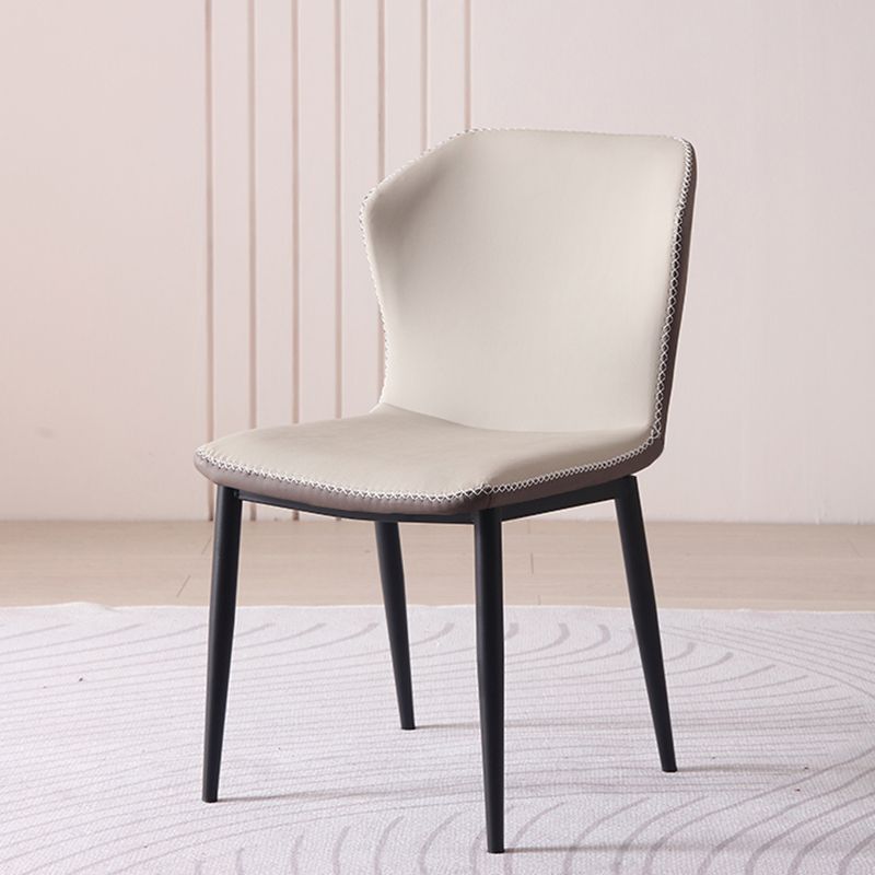 現代のアームレスダイニングチェアフェイクレザーウィングバックサイドチェア