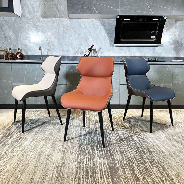 Minimalist Design Wingback Arm Dining Chair Faux Leather Dining Chairs Clearhalo 'Dining Chairs' 'Dining Tables & Seating' 'dining_chair' 'furn' 'furn_dining_chair' 'Furniture' 'furniture_dining_chair' 'Kitchen & Dining Furniture' 1200x1200_4dc56954-9dd2-4dc4-bb15-34f02cc1403e